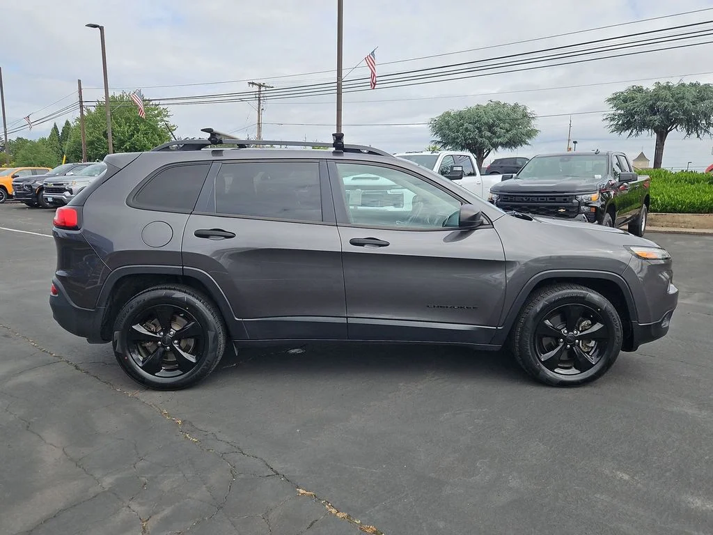 Used 2016 Granite Crystal Metallic Clearcoat Jeep Sport image 7