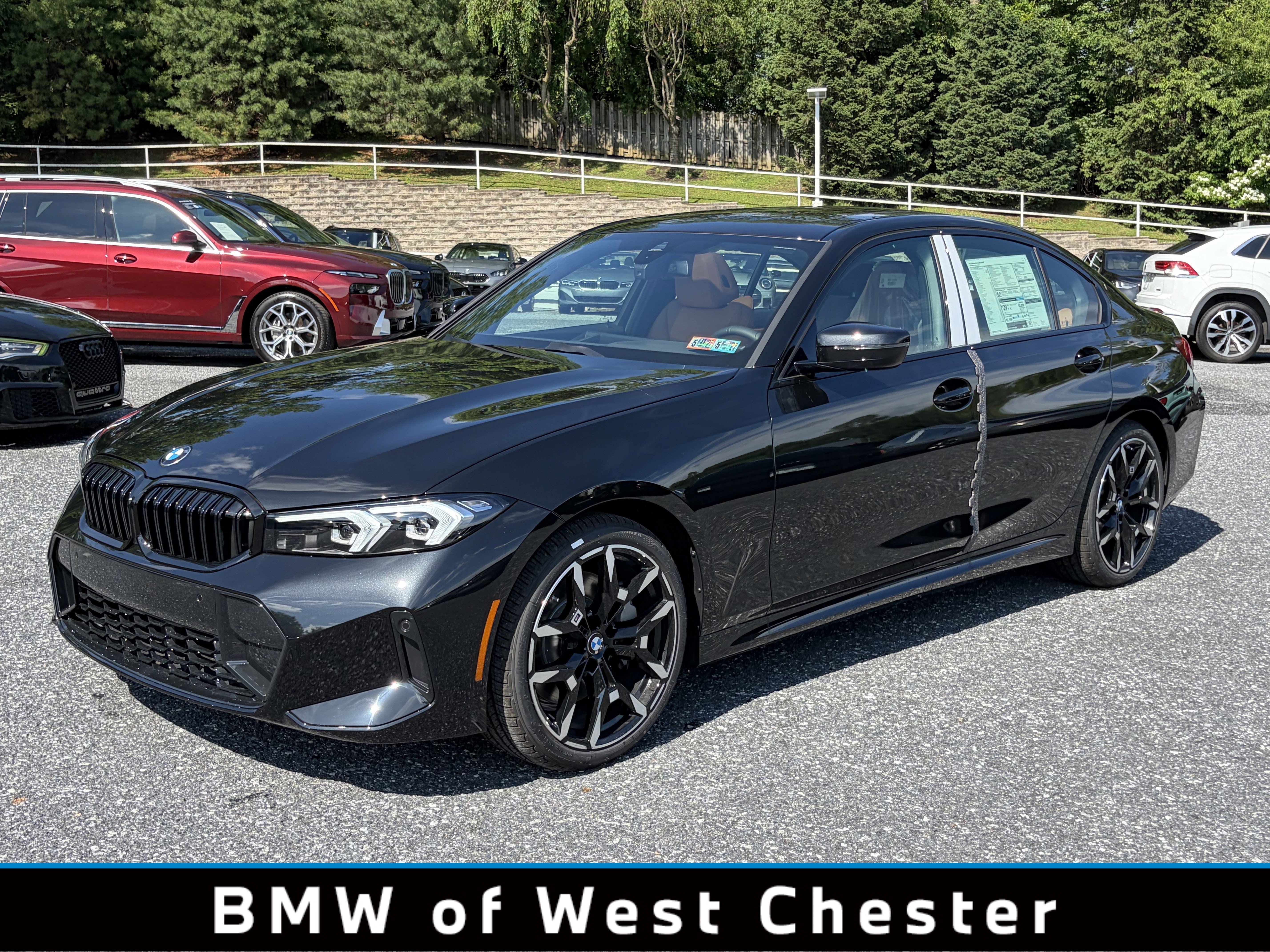 New 2026 Black Sapphire Metallic BMW 330i xDrive image 1
