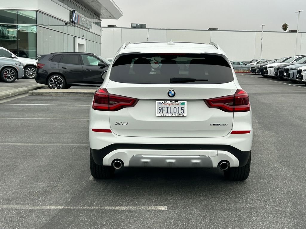 Used 2021 Alpine White BMW sDrive30i image 4