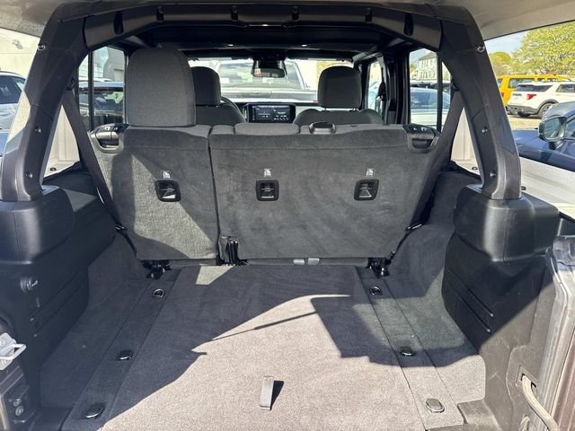 Used 2025 Granite Crystal Clearcoat Metallic Jeep Sport S image 5