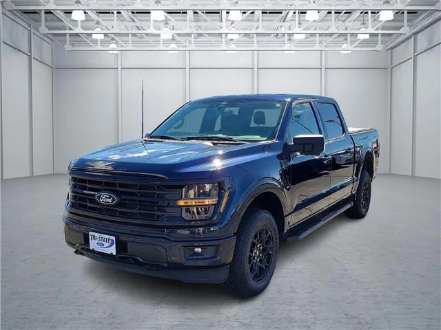 Used 2024 Blue Ford XLT 4x4 SuperCrew Cab 5.5 ft. box 145 in. WB image 1