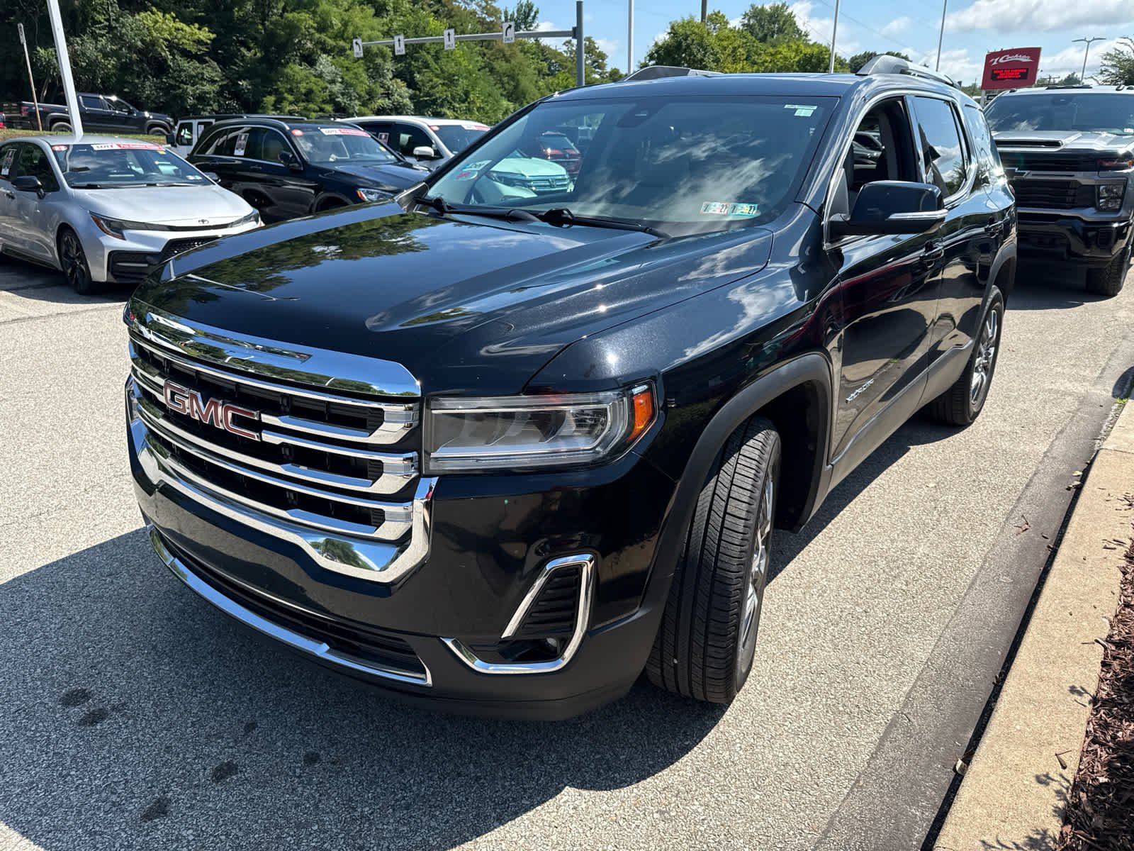 Used 2022 EBONY TWILIGHT METALLIC GMC SLT image 1