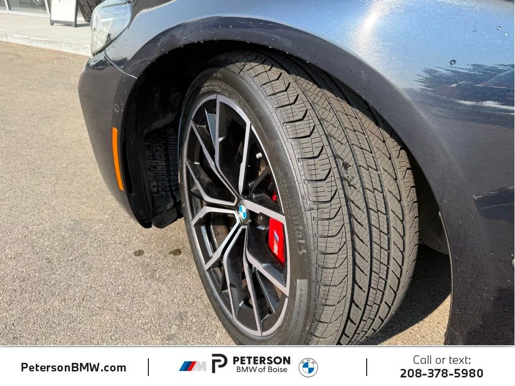 Used 2023 Black BMW M550i xDrive image 36