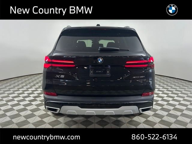 New 2026 Black Sapphire Metallic BMW xDrive40i image 6