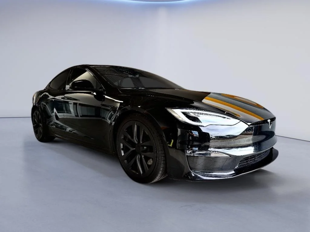Used 2022 Solid Black Tesla Plaid image 2