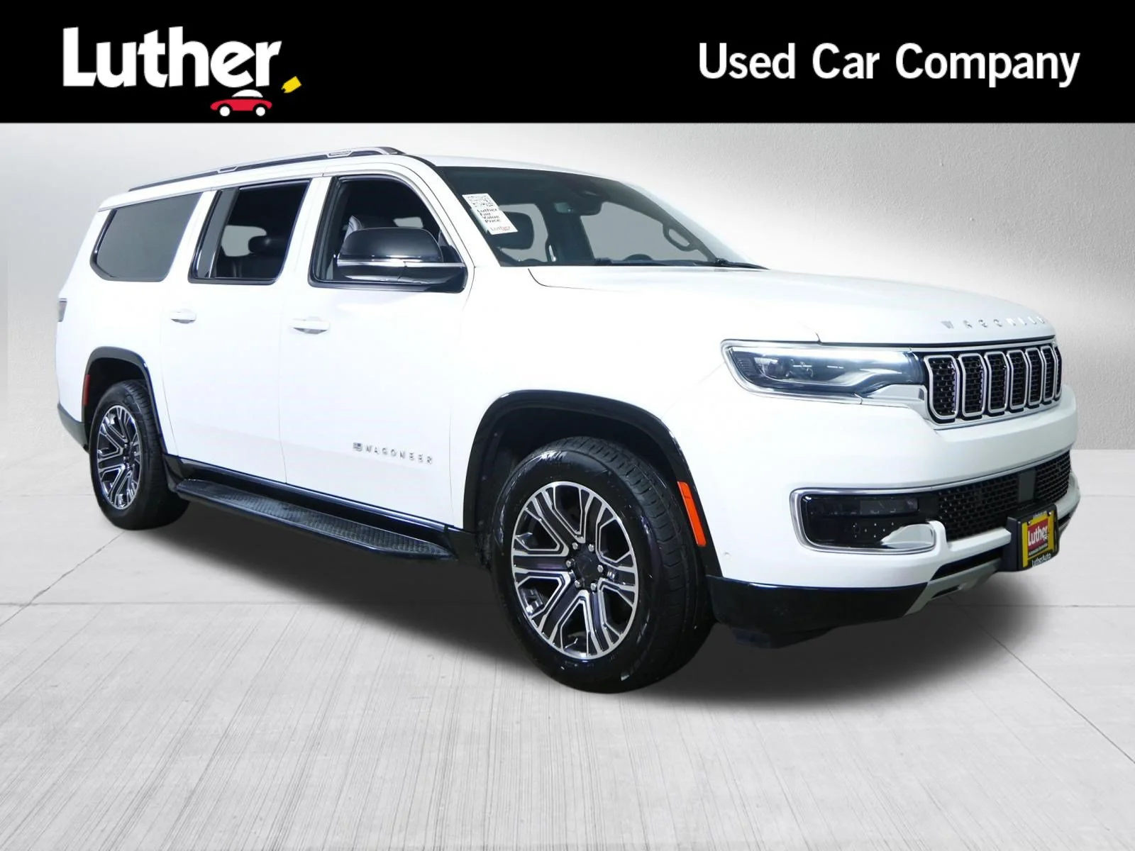 Used 2023 Bright White Clearcoat Jeep Series II image 1