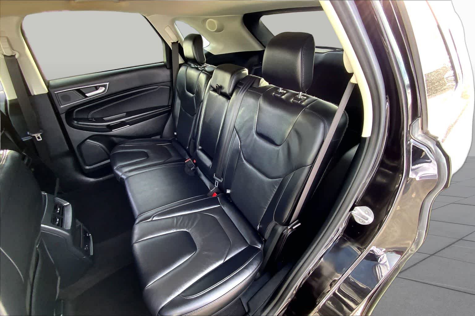 Used 2022 Agate Black Metallic Ford Titanium image 19