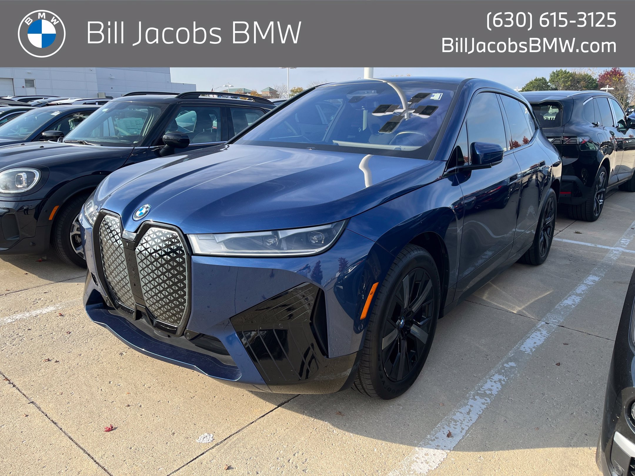 Certified Used 2024 Phytonic Blue Metallic BMW xDrive50 image 1