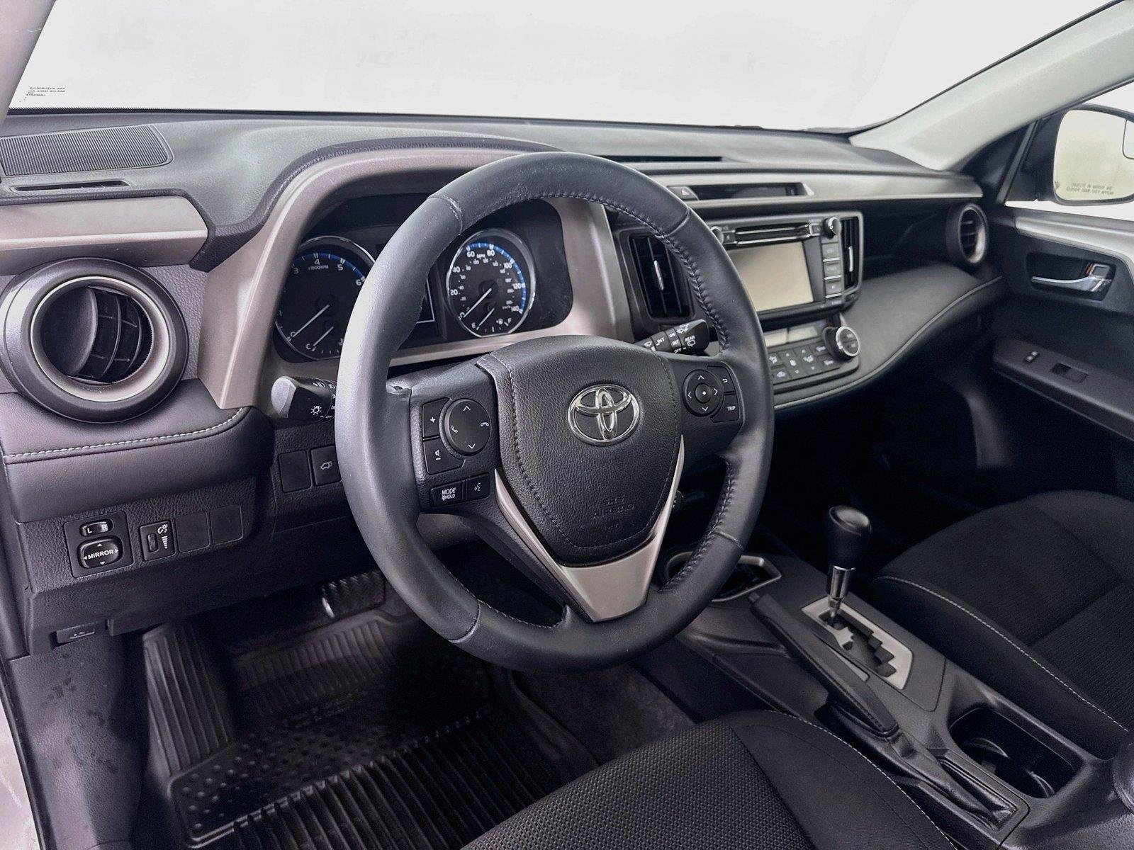 Used 2016 Silver Sky Metallic Toyota XLE image 4