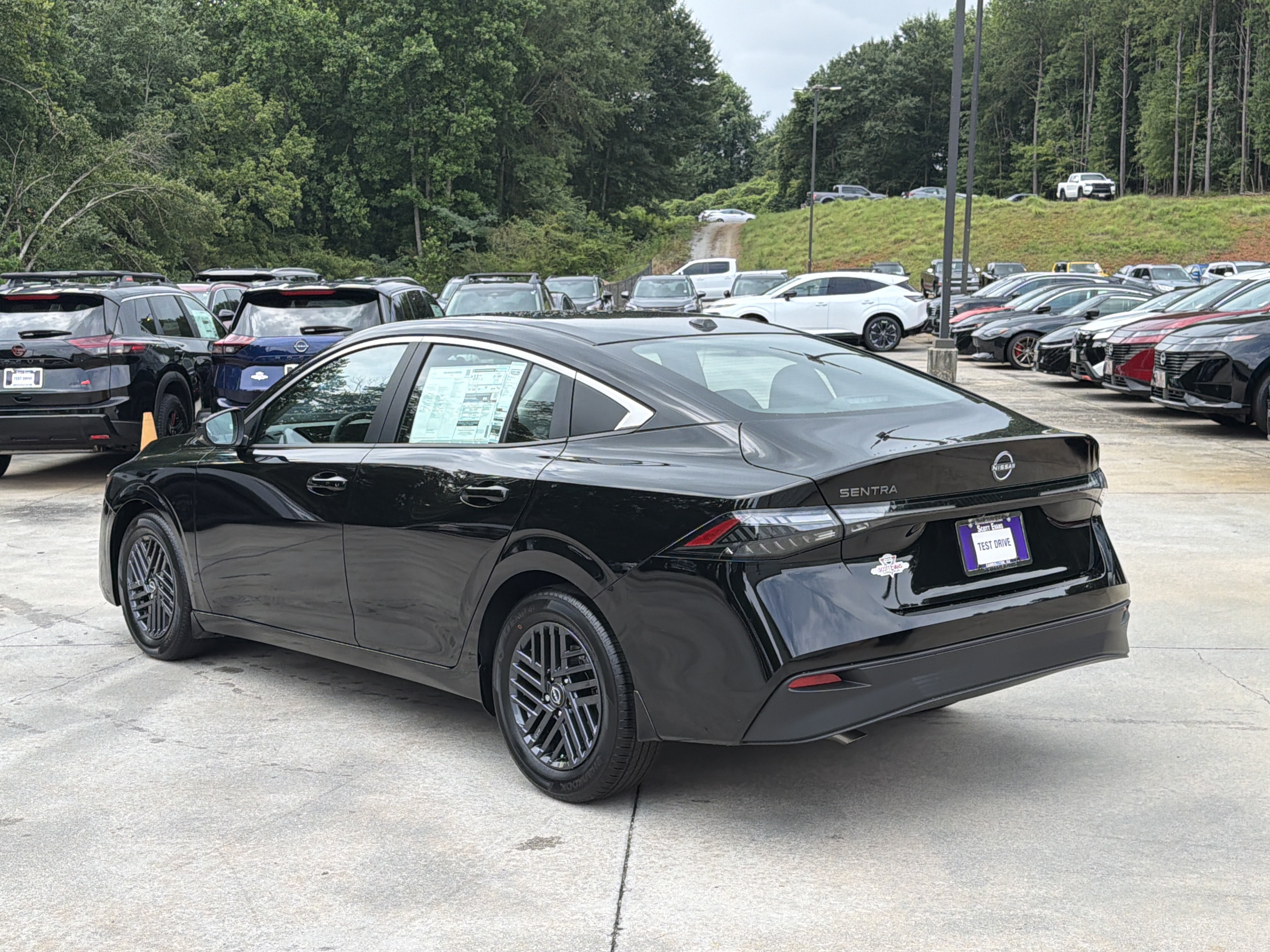 New 2026 Super Black Nissan SV image 6