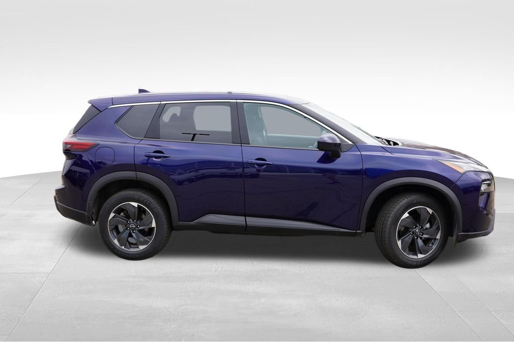 Used 2025 Deep Ocean Blue Pearl Nissan SV image 2