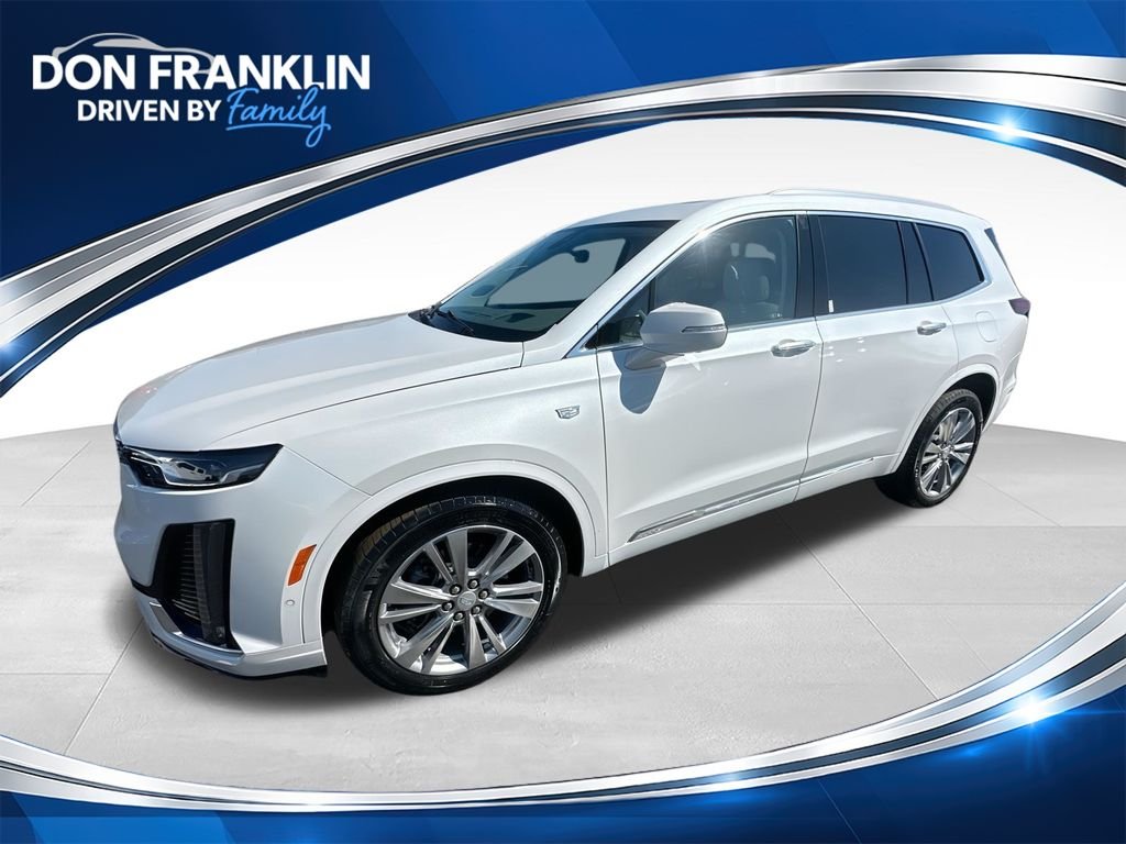 Used 2024 White Cadillac Premium Luxury image 1