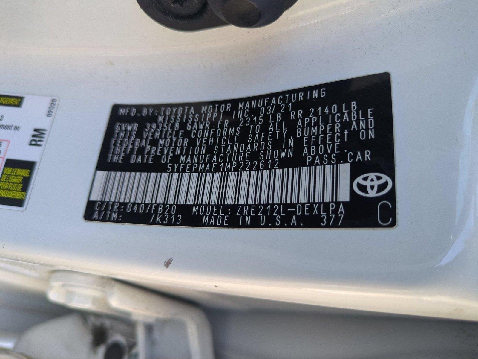 Used 2021 Super White Toyota LE image 37