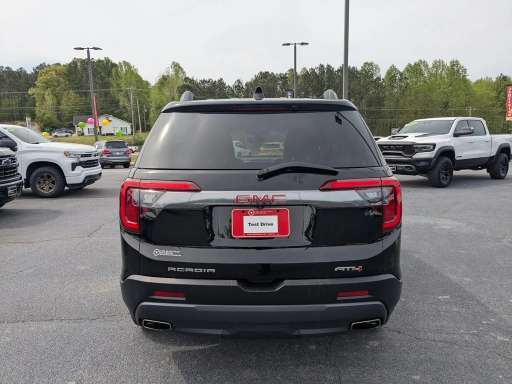 Used 2023 Ebony Twilight Metallic GMC AT4 image 6