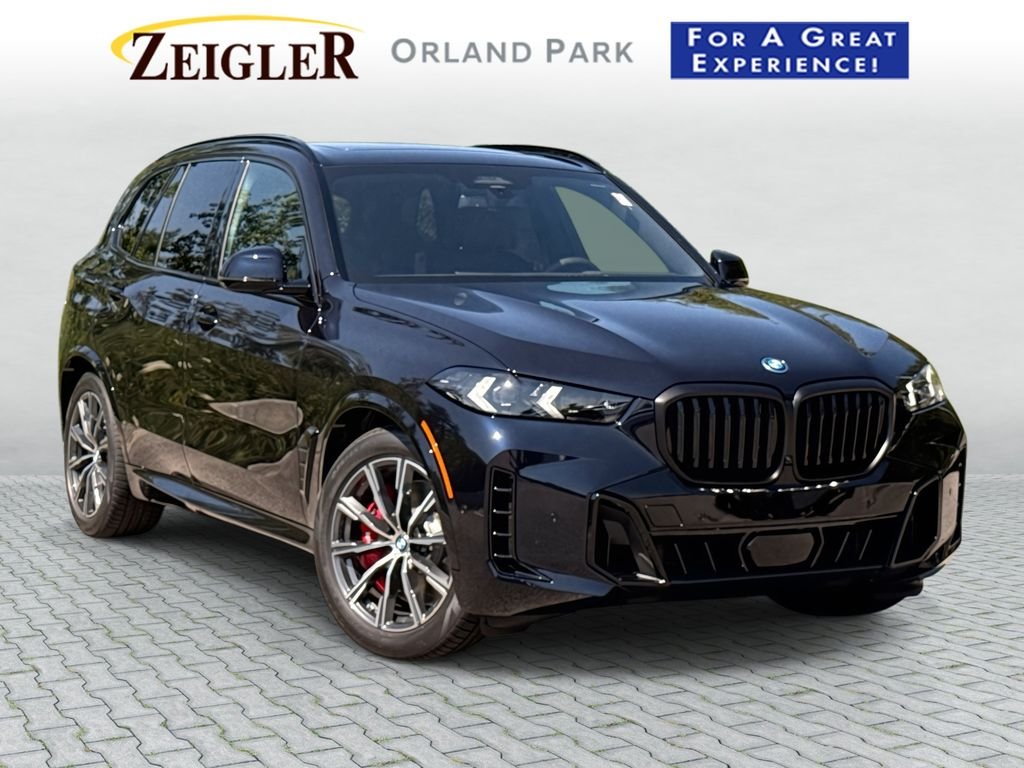 New 2026 Carbon Black Metallic BMW xDrive50e image 1