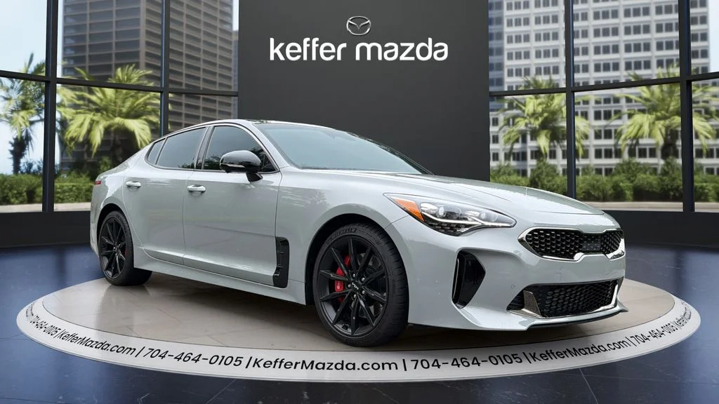 Used 2023 Ceramic White Kia GT2 image 1