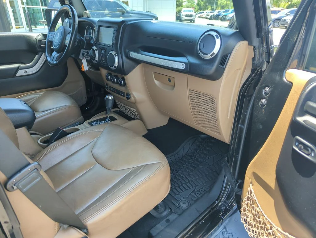 Used 2014 Black Jeep Unlimited Sahara image 32