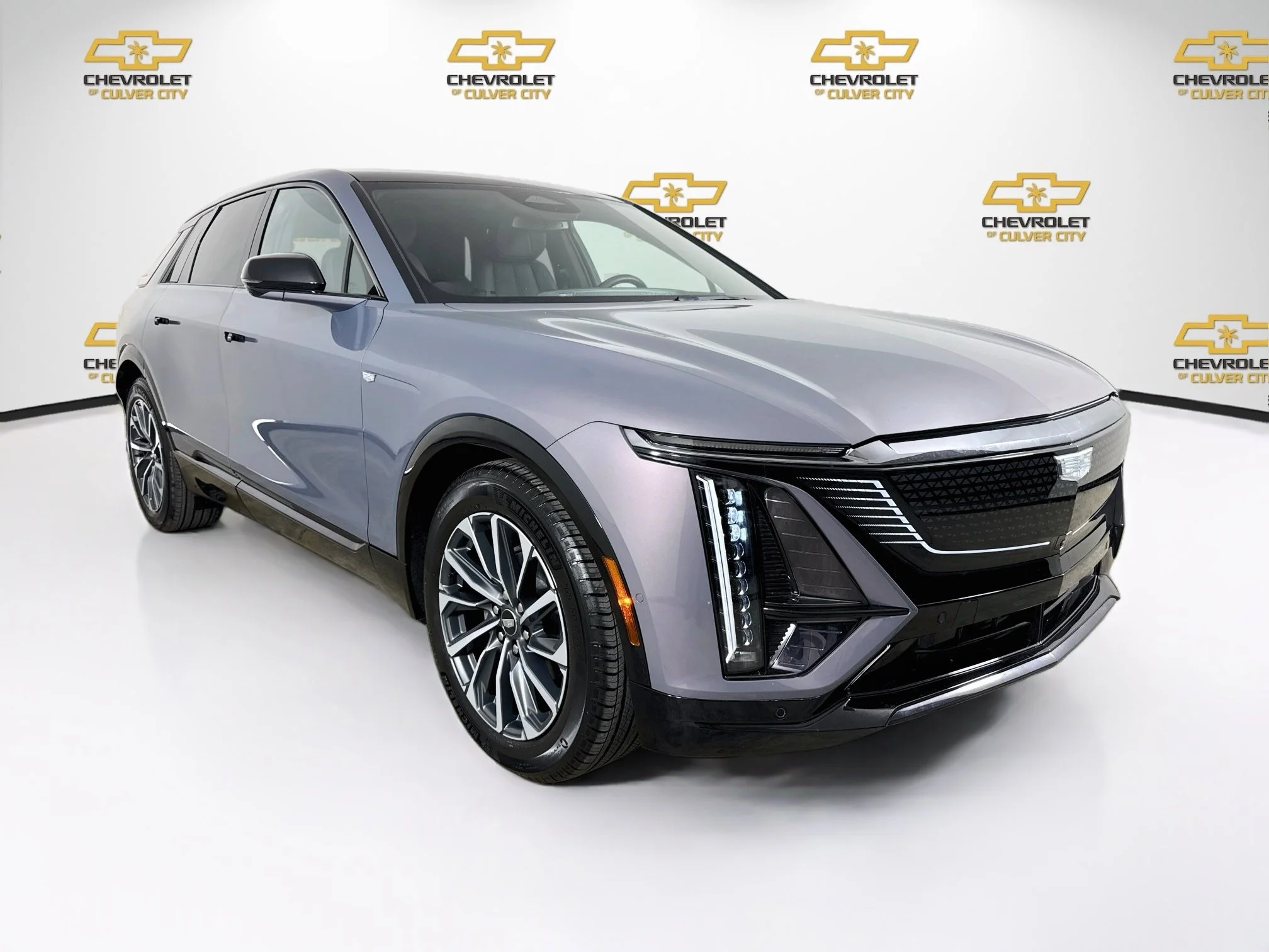 Used 2024 Celestial Metallic Cadillac Sport 1 image 1