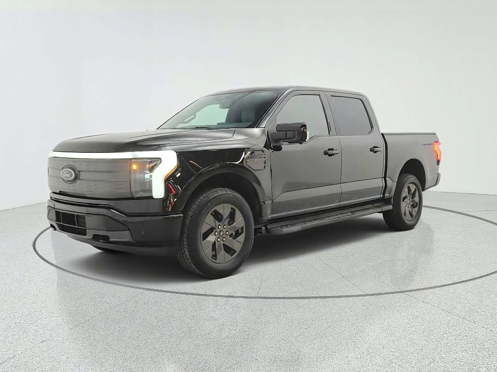 Used 2022 Agate Black Metallic Ford LARIAT image 1