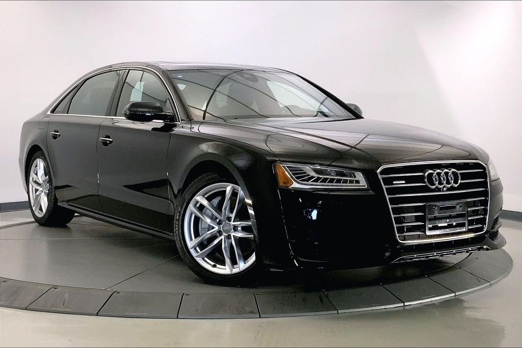 Used 2016 Black Metallic Audi L 4.0T Sport image 1