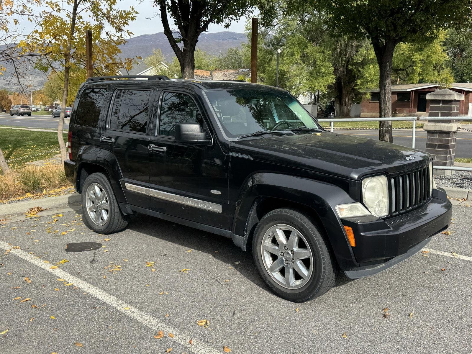 Used 2012 Brilliant Black Crystal Pearl Jeep Sport Latitude image 4