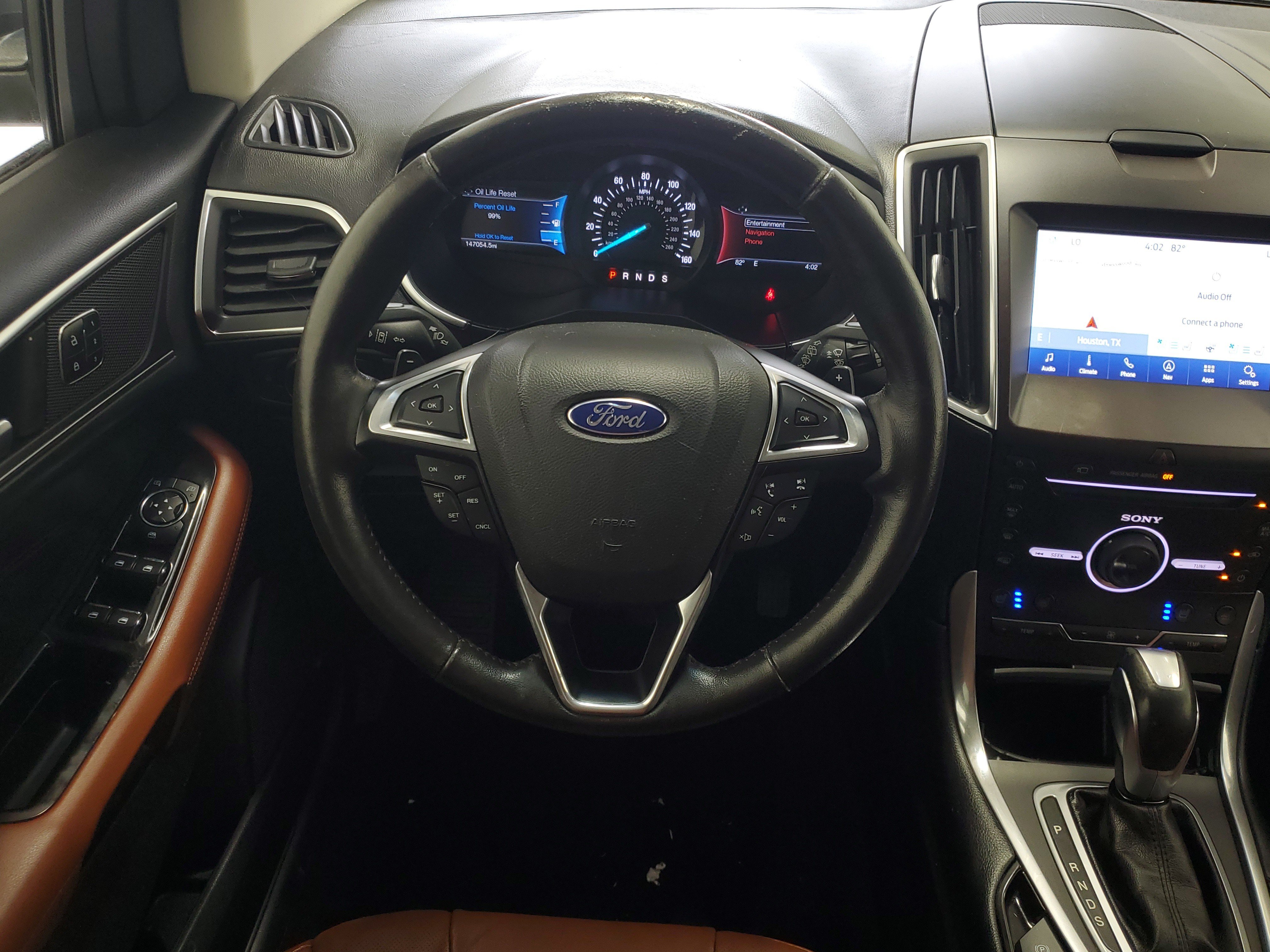 Used 2015 Magnetic Metallic Ford Titanium image 18