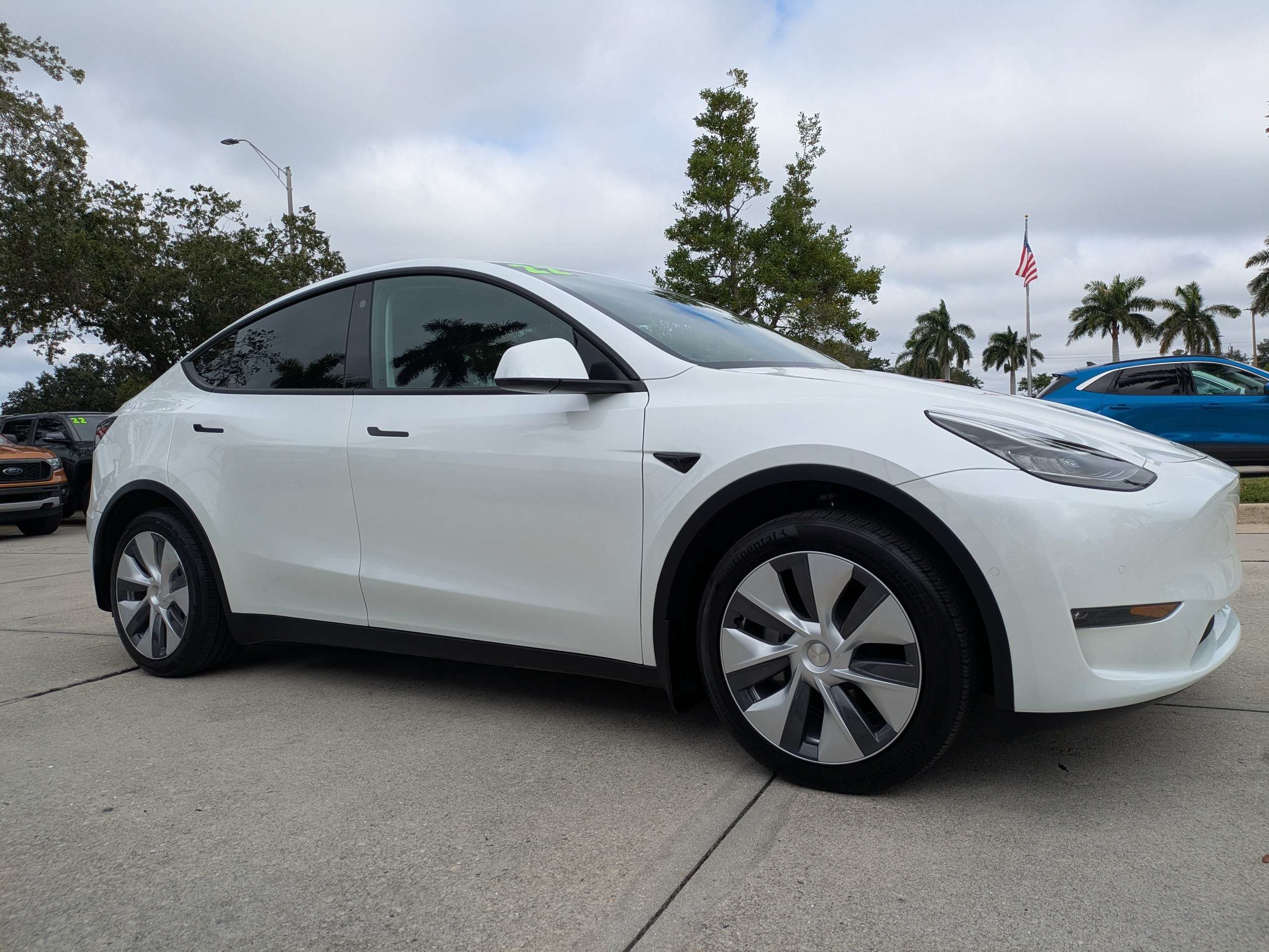 Used 2022 Tesla Model Y Long Range with VIN 7SAYGDEE6NA012785 for sale in Naples, FL