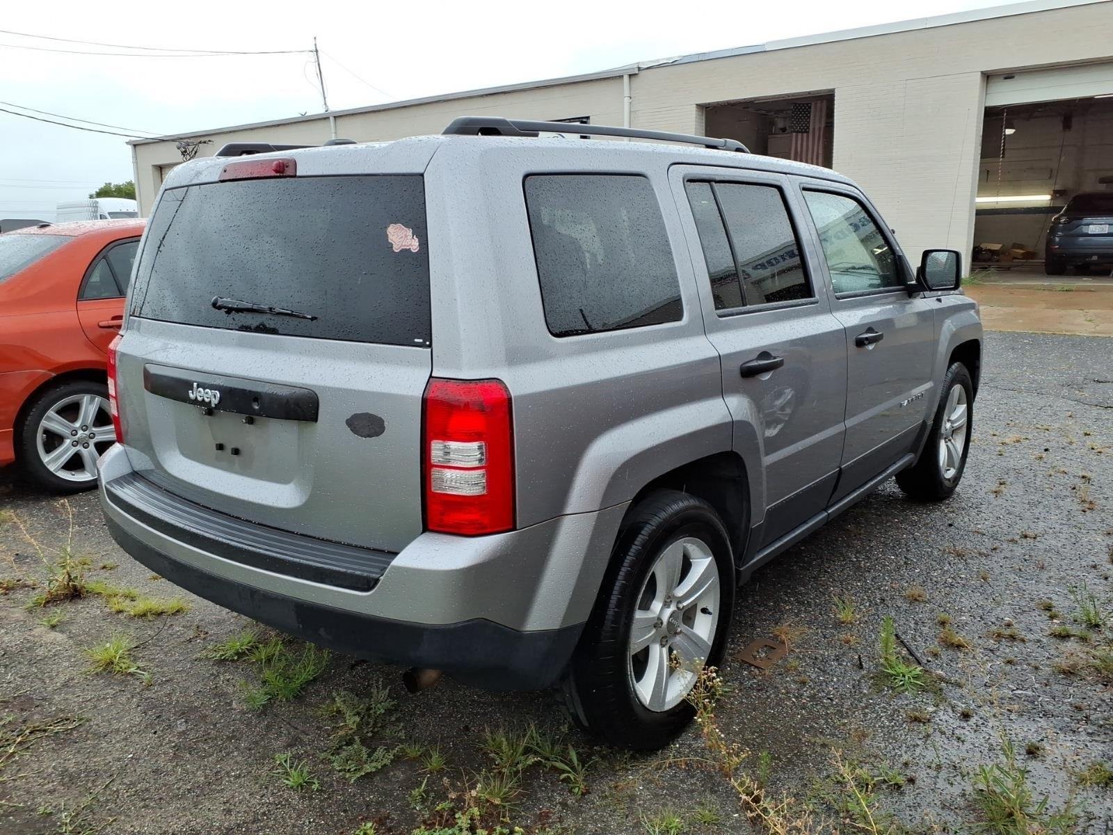 Used 2016 Deep Cherry Red Crystal Pearlcoat Jeep Sport image 6