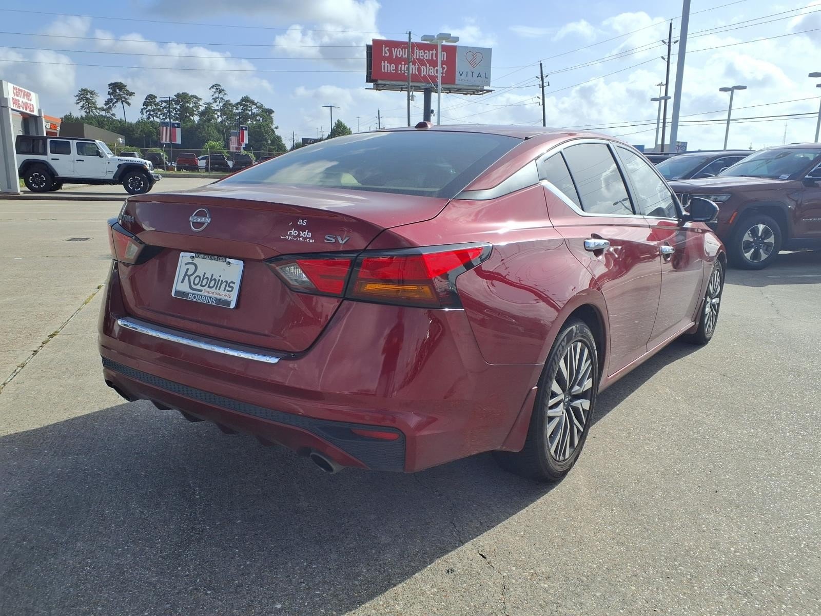 2023 Nissan Altima 2.5 SV Red at Robbins Nissan