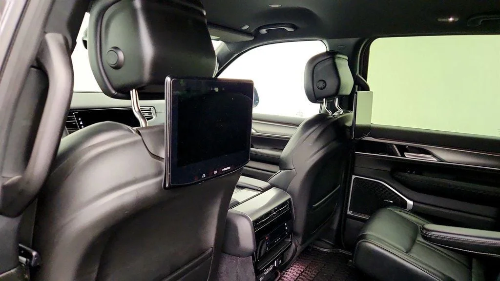 Used 2025 Diamond Black Crystal Pearlcoat Jeep Series II Carbide 4x4 w/ Rear Entertainment & 20