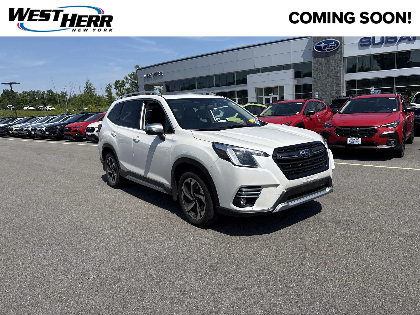 Used 2023 Crystal White Pearl Subaru Touring image 1
