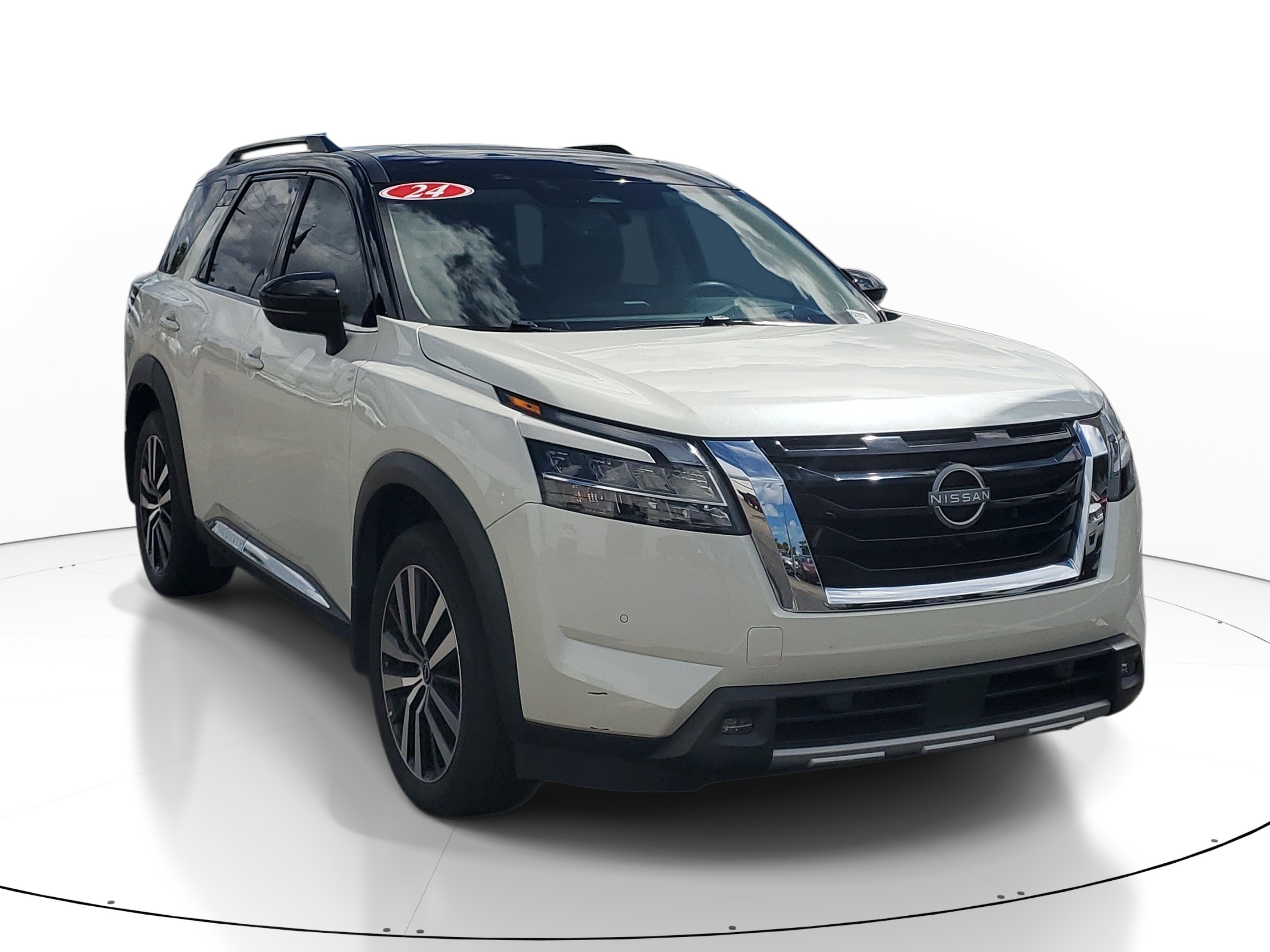 Used 2024 Pearl White Tricoat/Super Black Nissan Platinum image 1