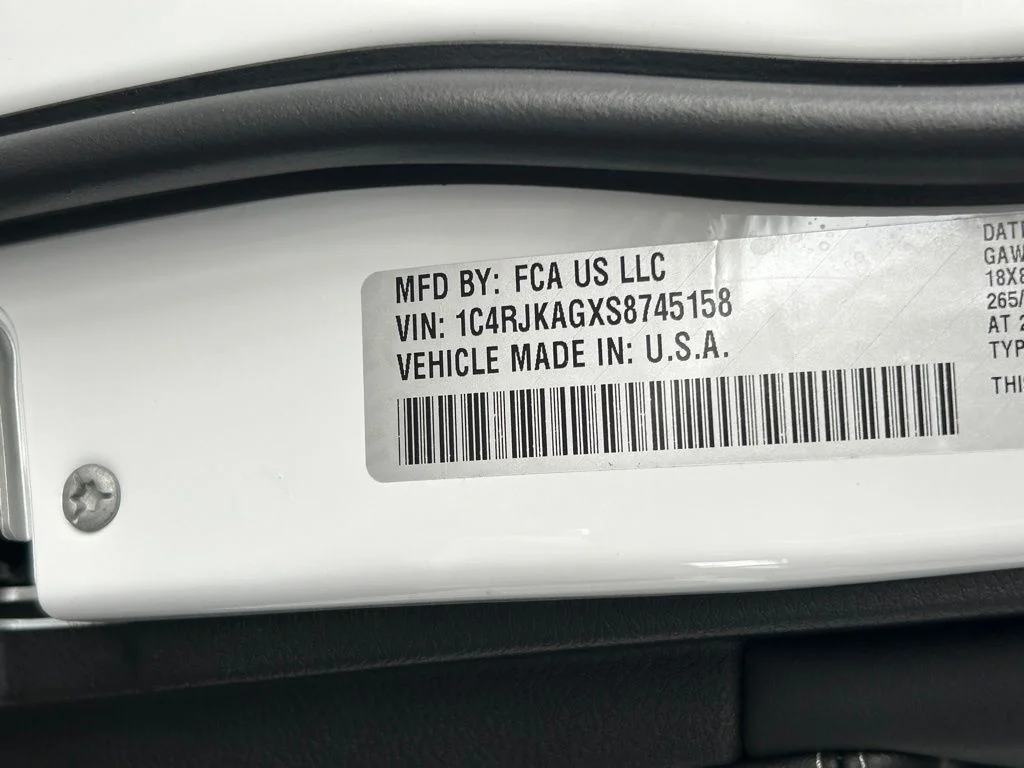 Used 2025 Bright White Clearcoat Jeep Laredo image 52