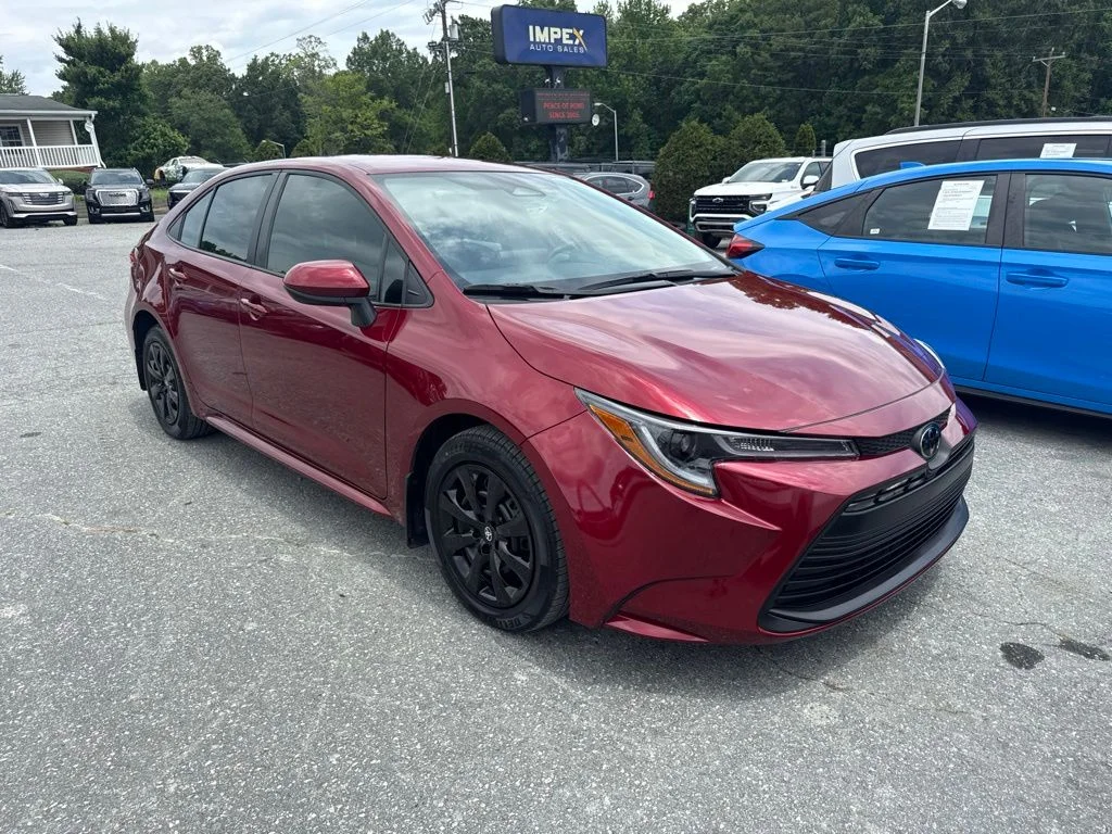 Used 2025 Red Toyota LE image 2