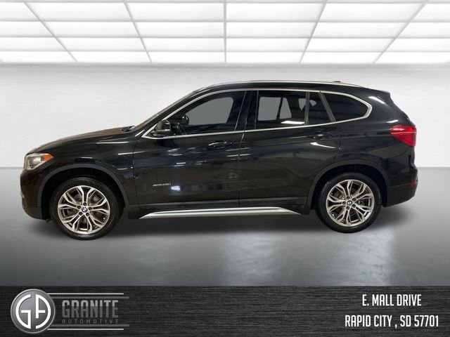 Used 2016 BMW X1 28i with VIN WBXHT3Z36G4A49222 for sale in Rapid City, SD