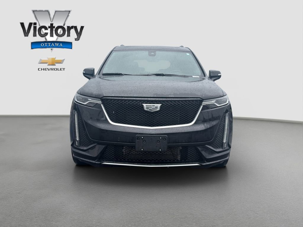 Used 2023 Stellar Black Metallic Cadillac Sport image 2
