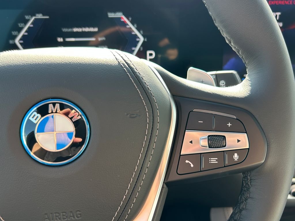 New 2026 Tanzanite Blue II Metallic BMW xDrive50e image 20