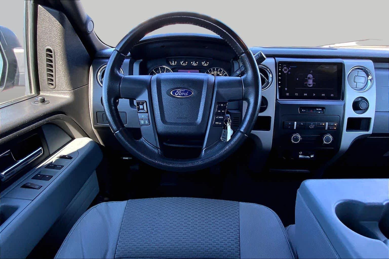 Used 2012 Dark Blue Pearl Metallic Ford XLT image 6