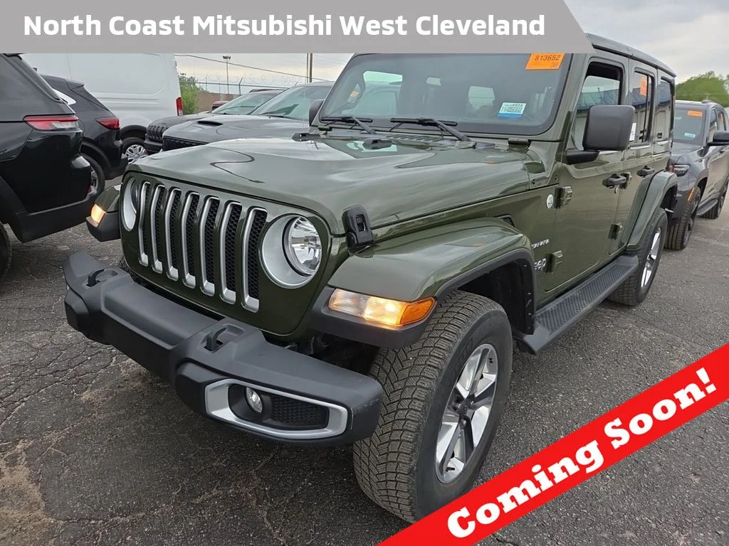 Used 2021 Green Jeep Unlimited Sahara image 1