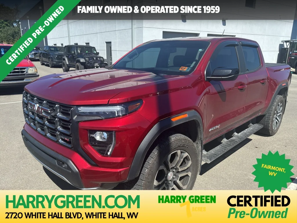 Used 2024 Volcanic Red Tintcoat GMC 4WD AT4 image 1