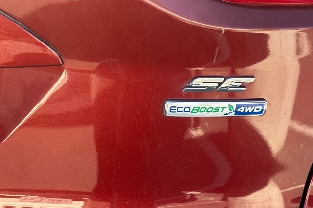 Used 2014 Orange Ford SE image 8