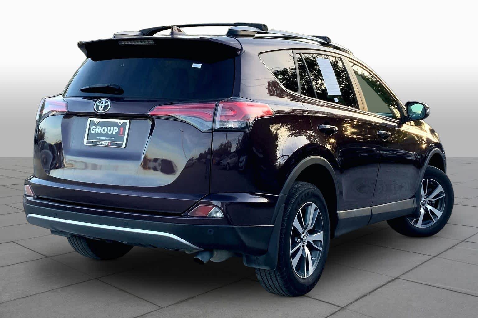 Used 2018 Black Currant Metallic Toyota XLE image 13