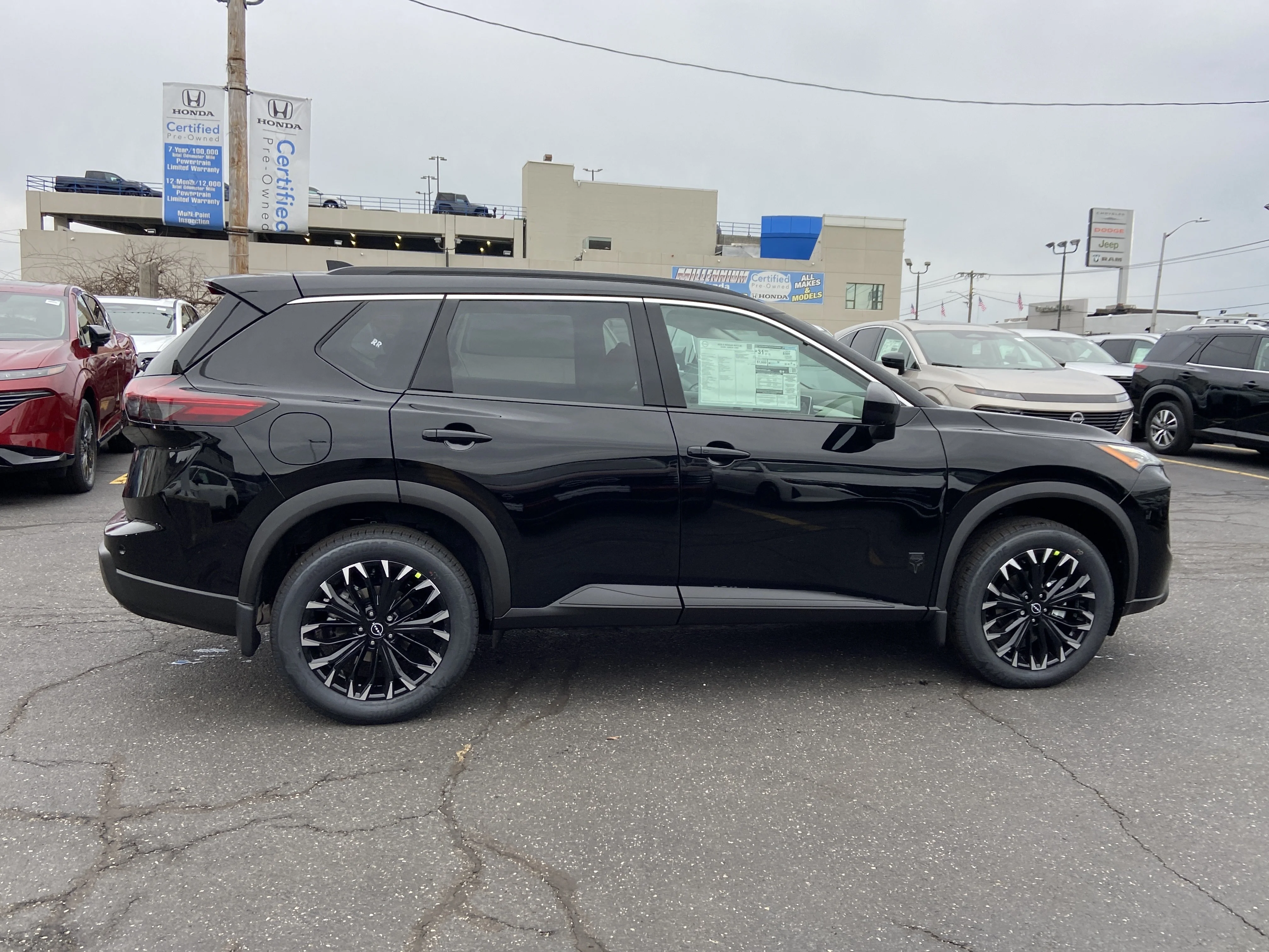 New 2026 Super Black Nissan Dark Armor image 3