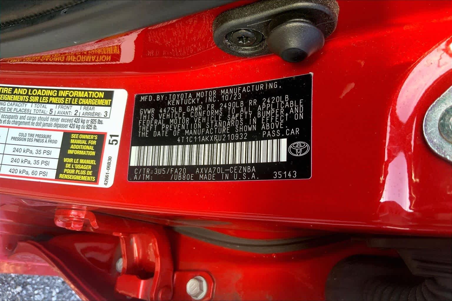Used 2024 Supersonic Red Toyota LE image 30