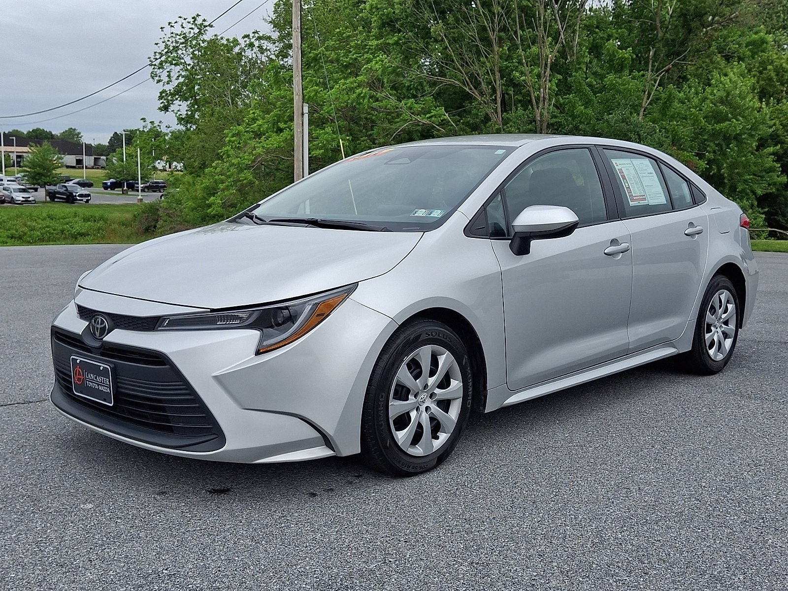 Used 2023 Classic Silver Metallic Toyota LE image 3
