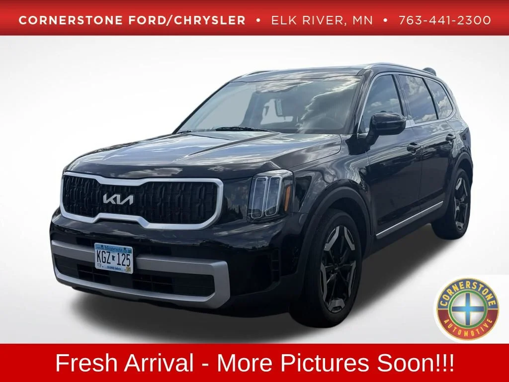 Used 2023 Ebony Black Kia EX image 1