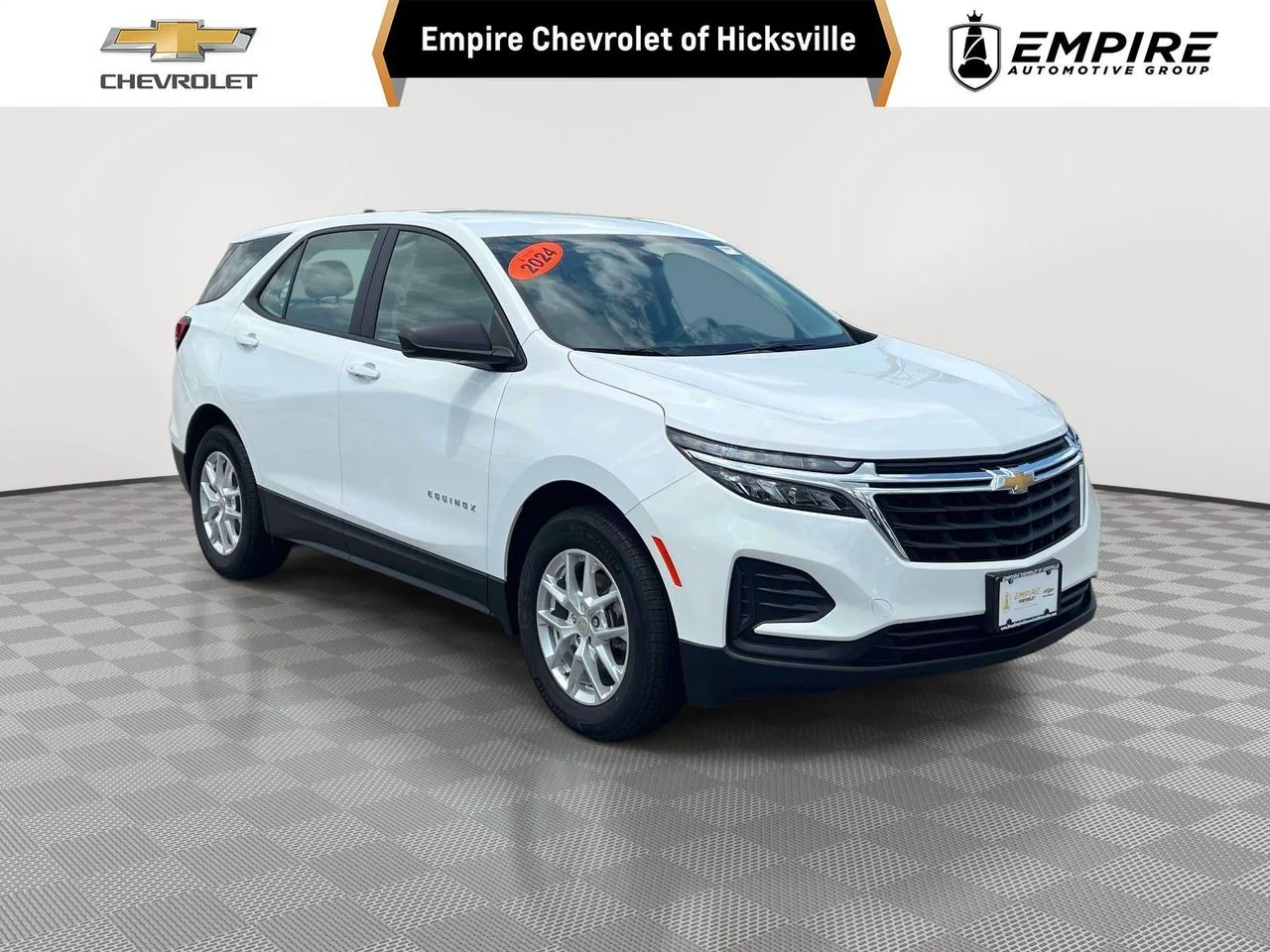 Used 2024 Summit White Chevrolet FWD LS image 1