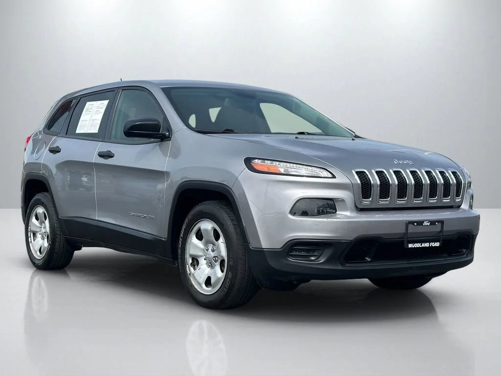 Used 2017 Gray Jeep Sport image 1