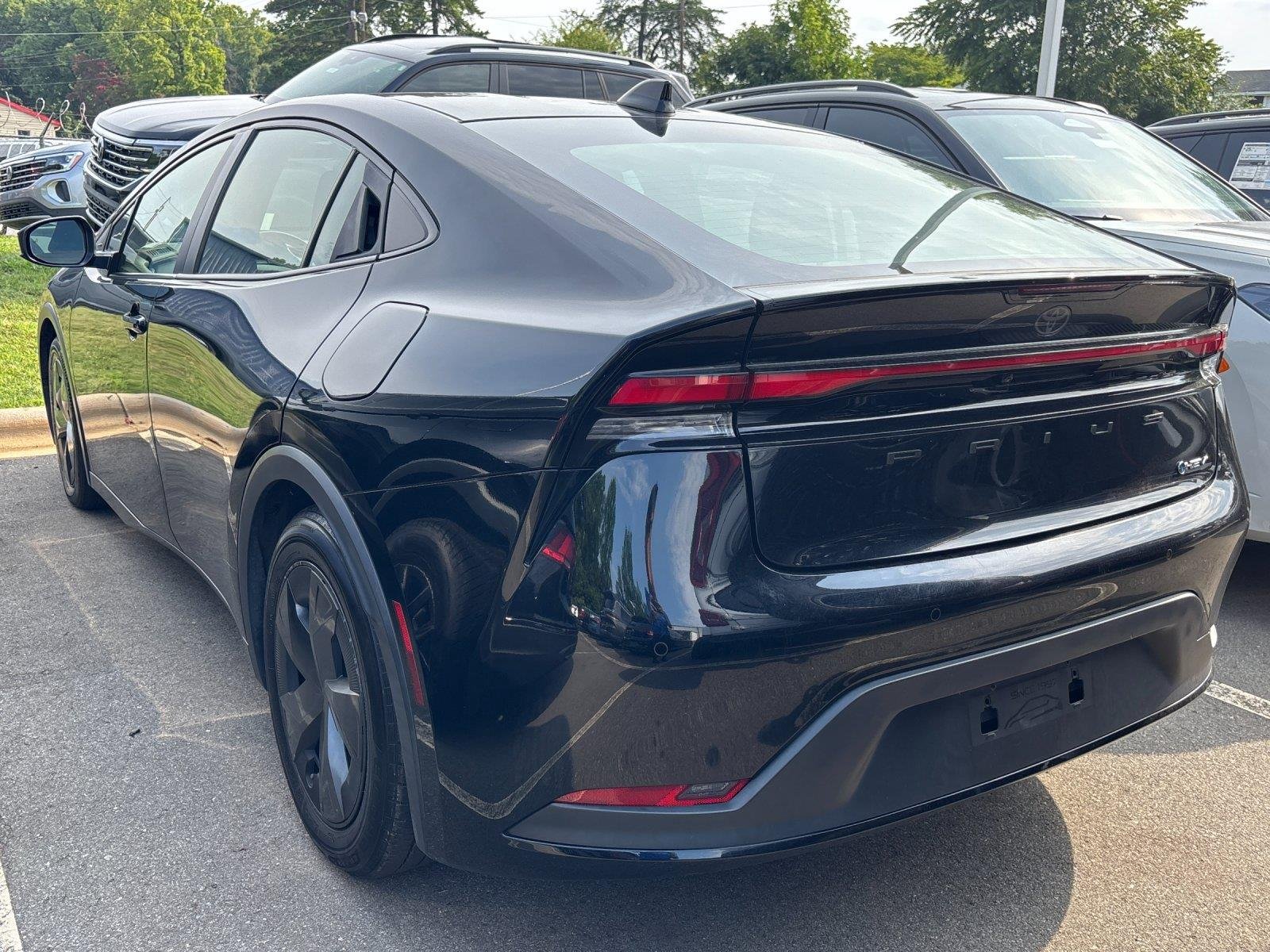 Used 2023 Midnight Black Metallic Toyota LE image 3