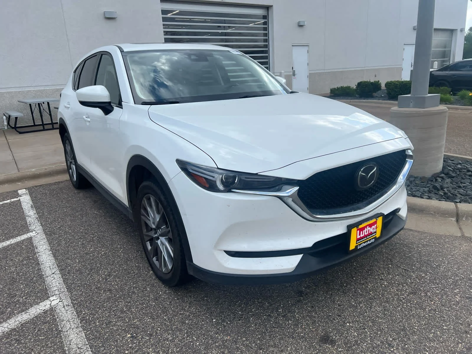 Used 2021 Mazda CX-5 Grand Touring Reserve with VIN JM3KFBAY1M0466427 for sale in Brooklyn Center, Minnesota